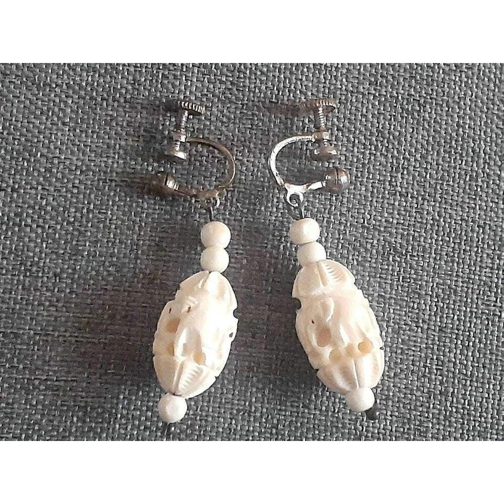 Mid century cream colored elephant design earrings